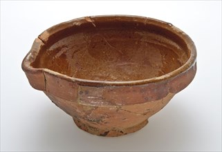 Bowl of red earthenware on stand ring, collars edge with pouring lip, internally glazed, bowl crockery holder soil find ceramic