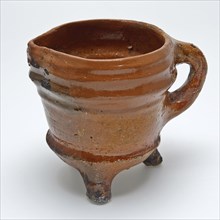 Pottery cup or jug on three legs, conical in shape with round bottom, grape cooking pot tableware holder utensils earthenware