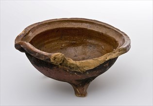 Pottery saucepan on three legs, pouring lip, cup-shaped with broken stem, saucepan casserole dishes holder utensils earthenware