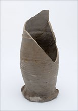 Fragment stoneware jug on pinched foot with slightly curved body and cylindrical neck, pot jug jug crockery holder fragment soil