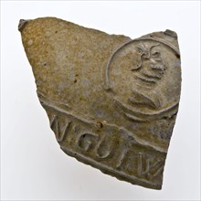 Belly fragment of stoneware jug decorated with portrait medallion and frieze with text, jug crockery holder fragment soil find