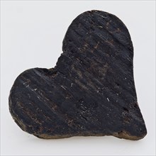 Small wooden heart, decoration soil find wood, sawn cut Wooden heart. Cut out heart of soft wood Clear wood grain archeology