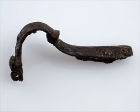 Bronze fibula or cloak pin with broad, short back, without pin, fibula fastener soil find bronze metal, cast hammered pulled
