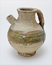 Pottery spout jug, gray shard with lead glaze green on the shoulder, jug crockery holder soil find ceramic earthenware glaze