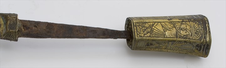 Fragment of an iron knife with an edged handle, on which two caressing pair are engraved, knife cutlery soil find iron bronze