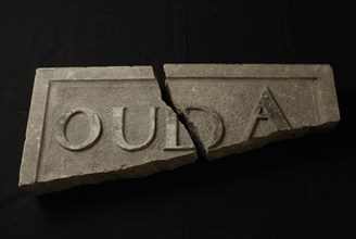 Fragment of facing brick with text OUD, facing brick building part stone 31,5, minced rectangular frame and text in high relief