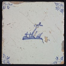Scene tile, landscape tile with wooden cross, blue decor on white ground, corner filler ox head, wall tile tile sculpture