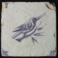 Animal tile with bird on branch, blue decor on white ground, corner filling ox's head, wall tile tile sculpture ceramic