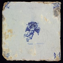 Wijtmans, Figure tile with angel and wreath, blue decor on white ground, corner filler ox head, marked, wall tile tile sculpture