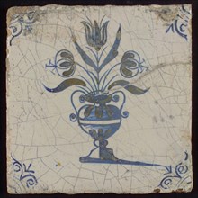 Flower tile with large flower pot, blue decor on white ground, corner filling: ox head, wall tile tile image ceramics pottery