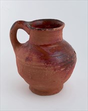 Red earthenware jug placed on stand, jug crockery holder soil find ceramic earthenware glaze lead glaze, hand-turned glazed