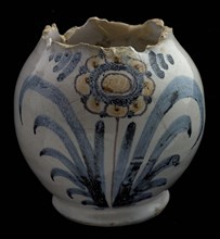 Fragment of faience jug, on which polychrome flower, schertskan, vase holder soil found ceramic earthenware glaze tin glaze