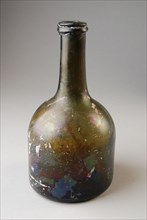 Green bottle with slender neck, raised soul, bottle holder soil find glass, Green bottle. Cylindrical long cylindrical neck