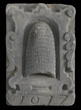 Facing brick with beehive in cartouche and below 1677, facing stone sculpture sculpture building component sandstone stone