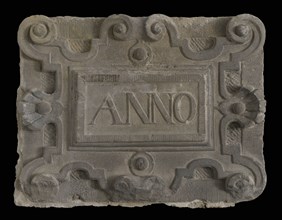 Facade stone with text ANNO from the facade of watchmaker William Gib, facing stone sculpture sculpture building component