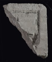 Fragment stone with text ioannis ... Sbania and later hacked frame, tombstone? memorial stone? facing brick? building component