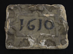 Facade stone with date 1610 in cartouche, facing stone foundation stone sculpture sculpture building component sandstone stone