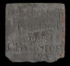 Facade stone with text The First Stone was laid by CB vd Stoel 1793, facing brick first stone building component ceramic pottery