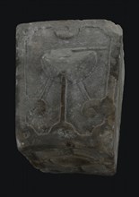 Stone of gate of vleeshal, Rotterdam, front chopping block, bottom decorated, keystone building element facing stone sculpture