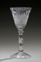 Goblet engraved with Apollo and the nine muses and opposite the statue of Erasmus, wineglass drinking glass drinkware tableware