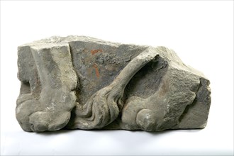 Fragment of the brick from the brewery De Twee Klimmende Leeuwen: lion's legs and tail, facing brick fragment sculpture