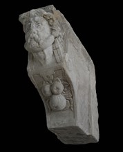 Console with male head and fruit, console building element sandstone stone paint, sculpted chimney