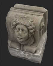 Console with female head, console building element sandstone stone, sculpted Console with female head left side rough right side