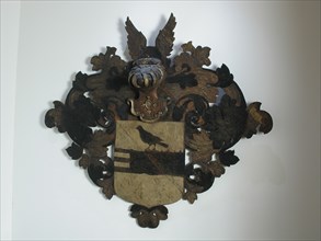 Piet Hein's wood coat of arms, in diamond shape, coat of arms information form wood paint, reverse panel inscription XXXVI