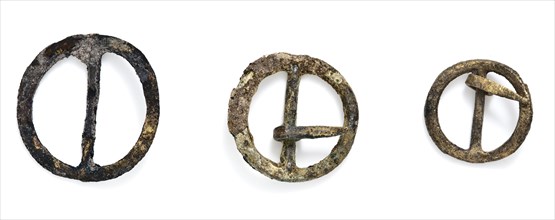 Three small buckles, round with middle post, clasp fastener component soil find brass copper metal largest, cast sawn 3 buckles