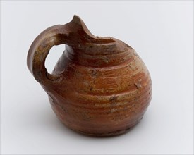 Stoneware jug be on convex surface, bulbous model with low belly, jug holder soil find ceramic stoneware glaze salt glaze, hand