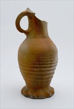 Stoneware jug with orange glow and gray dots, on squeeze foot, jug be found bottom ceramic stoneware, hand-turned baked