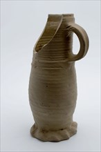 Gray stoneware jug on squeeze foot, jug be found on the bottom of the ceramic stoneware, hand-turned gray stoneware jug be