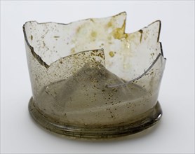 Fragment of foot (edge), bottom and part wall of cup, goblet drinking glass drinking utensils tableware holder soil find glass
