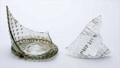 Two fragments of bottom, foot and part of wall of waffle cup, drinking cup drinking utensil holder soil find glass, hand-blown