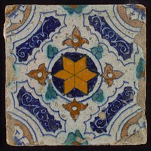 Tile, blue, green, brown and yellow on white, central yellow star in circle, sgraffito surfaces, corner motif quarter rosette
