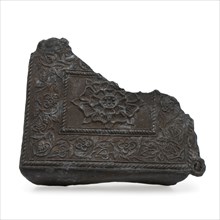 Fragment of tin box or batter with embossed decoration, lid closure fittings fragment soil find tin metal, Rectangular, chipped