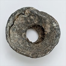 Pewter object with round hole, conical and disc-shaped, decorated, artifact soil found tin metal, cast soldered Small object