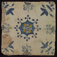 Tile, blue draft and orange on white, centrally flower within star shape, three-spot around, half rosette, corner pattern lily