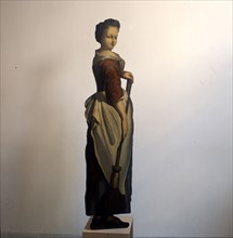 Painted with young lady or servant using broom, doll wood spruce paint oil paint, sawn painted From wooden plank sawn figure