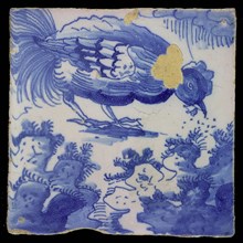 Blue tile with rooster and between plants, of 13-tile chimney pilaster, tree of bunches of grapes, between which some birds
