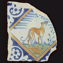 Animal tile, multicolored with hunting dog in square and on the backside kiln bookkeeping, corner motif palmet, wall tile