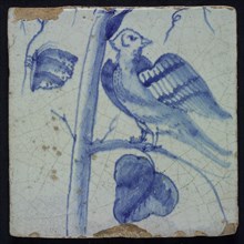 Blue tile on light blue background, with bird on grape leaf, stem, butterfly of chimney pilaster with 13 tiles, tree of bunches