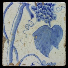 Blue tile on pale blue ground, with grape leaf and stem, stem of chimney pilaster with 13 tiles, tree of bunches of grapes