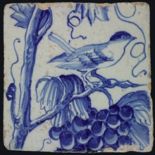 Blue tile with side-view bird, sitting on grape leaf, trunk and bunch of pilaster pilaster with 13 tiles, tree of bunches