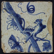 Blue tile with looking bird to butterfly, on vine leaf of chimney pilaster with 13 tiles, tree of bunches of grapes with birds