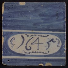 Blue tile with 1645 in white oval, between white horizontal lines, tile picture footage fragment ceramic pottery glaze, 1645