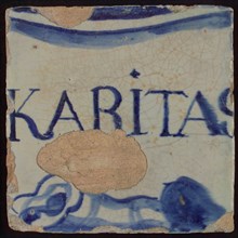 White tile with blue KARITAS, tile pilaster footage fragment ceramic earthenware glaze, KARITAS Caritas