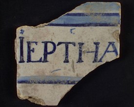 White tile with in blue IEPTHA between horizontal lines, tile picture footage fragment ceramics pottery glaze, IEPTHA Jefta