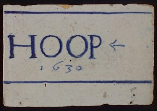 White tile with in blue HOOP and 1630 between horizontal lines, tile picture footage fragment ceramics pottery glaze, baked 2x