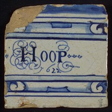 White tile with in blue Hoop and 1622 between horizontal decorated lines, tile picture footage fragment ceramics pottery glaze